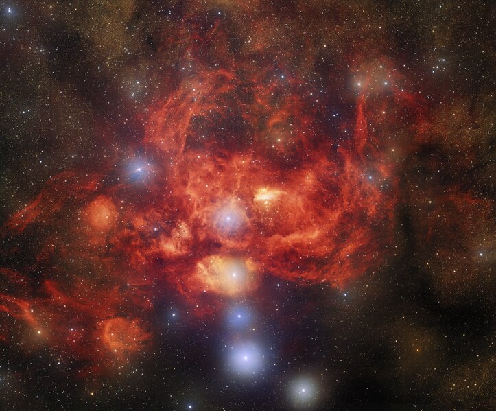 Dark_Energy_Camera_Captures_Bright,_Young_Stars_Blazing_Inside_Glowing_Nebula_(noirlab2221a).tif